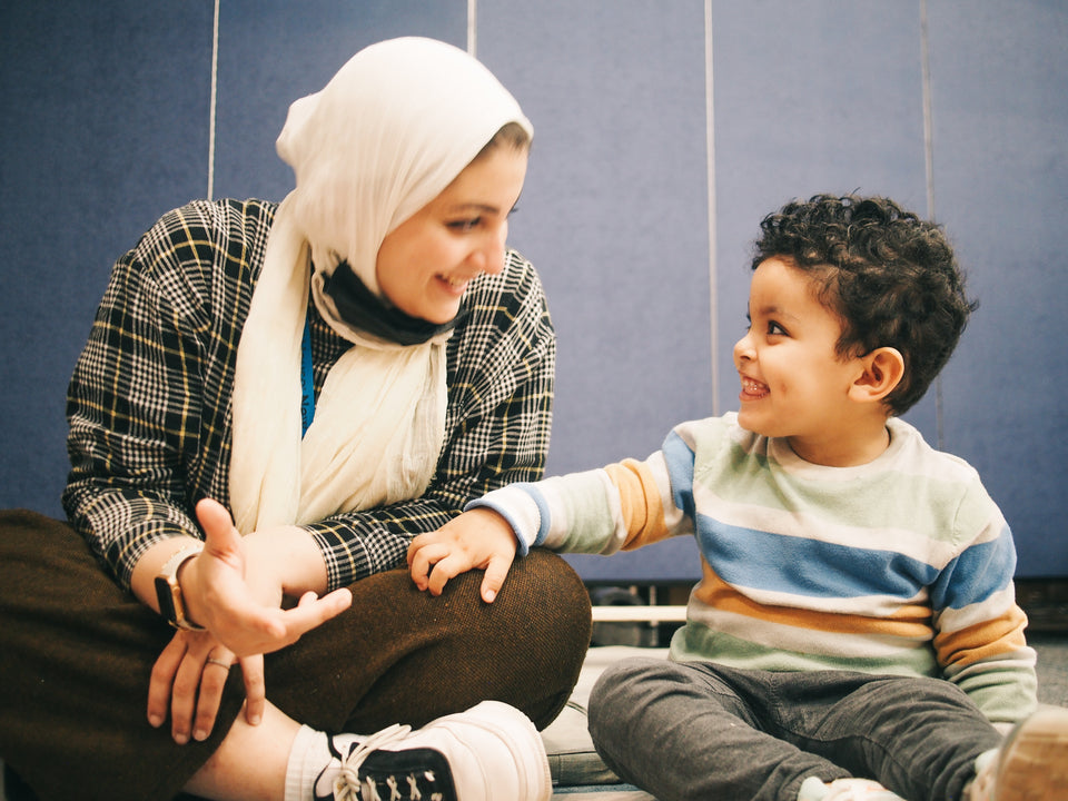 Mother and son in the RMH-NY playroom just having fun and smilin.