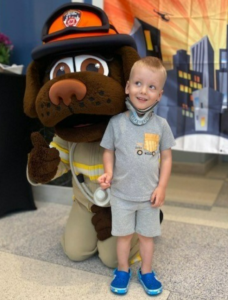RMH-NY Kid with a Fire dog