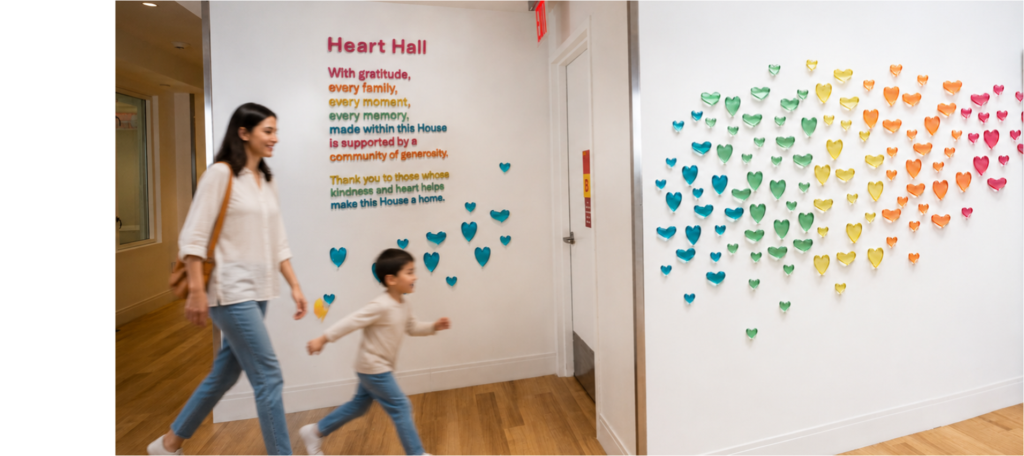 A family runs through Heart Hall tov get to the dining room.