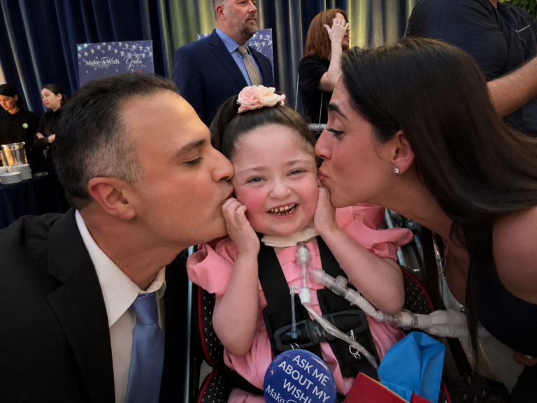 Mom and Dad kissing Sofia