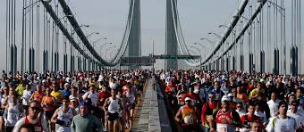 NYC marathon runners on a major bridge in NYC
